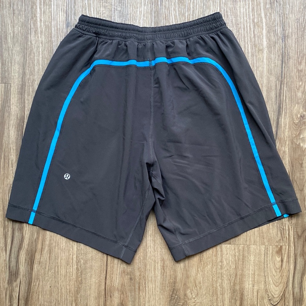 Lululemon Men’s Shorts.Waist 26”. Lined .Gray. Drawstrings. Pockets.